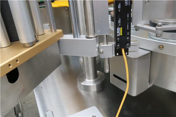 Vysokorýchlostný rotačný štítkovací etiketovací stroj s opaskom voliteľného plniaceho stroja